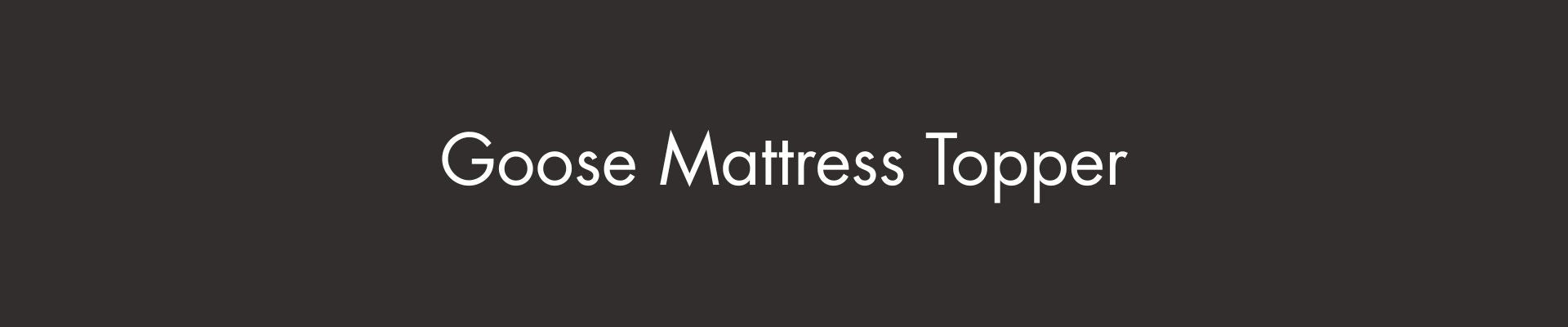 Luxury Goose Down Feather Mattress Topper with soft cotton cover, deep quilted design and plush hotel-quality comfort for a cosy and supportive night's sleep.